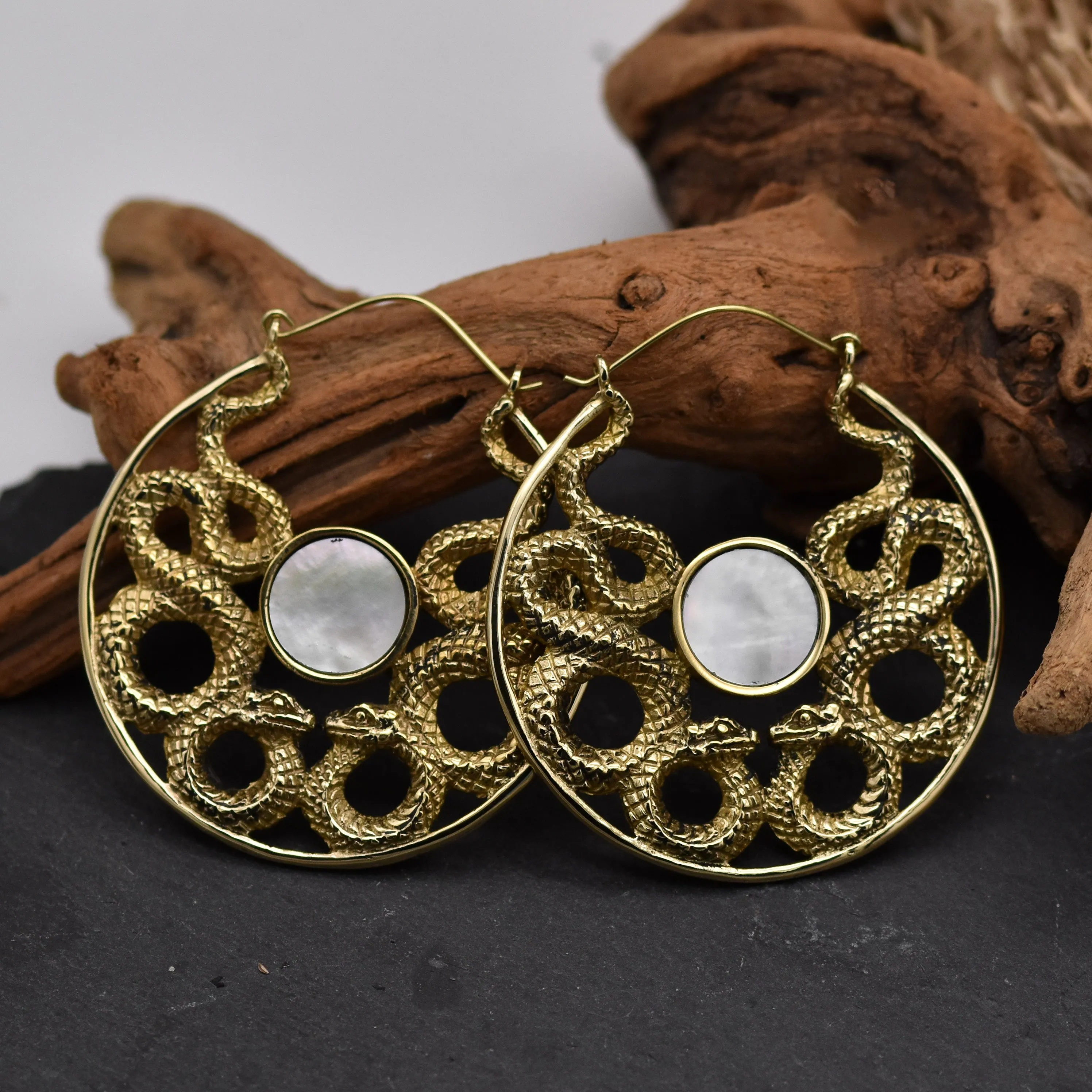 Sure! Heres an optimized title for the Golden Medusa Hoop Earrings:

Elegant Gold Medusa-Inspired Hoop Earrings – Stylish Statement Jewelry for Women