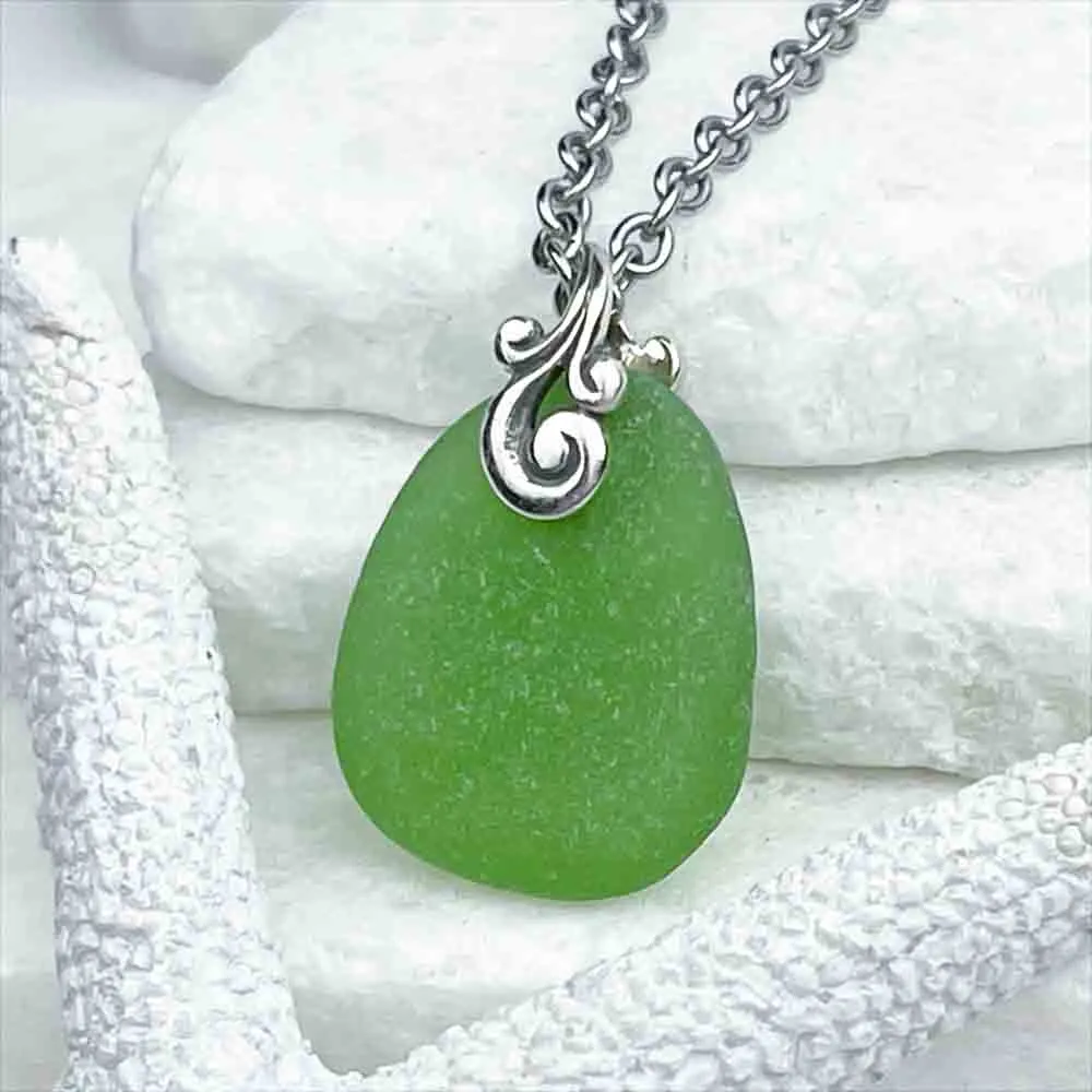 Graceful Oval-Shaped Green Sea Glass Pendant with Sterling Silver Ocean Waves Bail | #1744